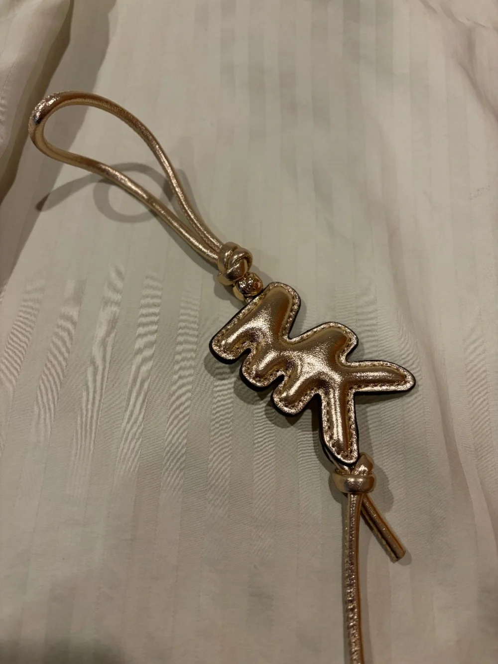 Like-New Michael Kors Leather Bag Charm